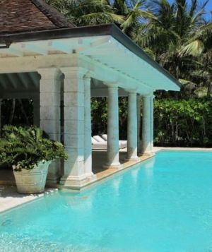 Photo by Oscar de la Renta of his Punta Cana gardens - pool house.jpg